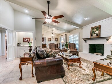 A large living room with nice foyer, bar/coffee st