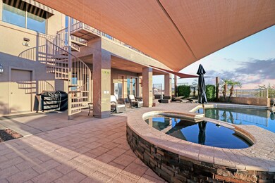 Porch, patio, heated pool and spa