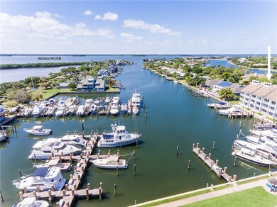 Harbor View of The Moorings with access to the Indian River; this view shows the Indian River in the background. Unit #102 is on the right.