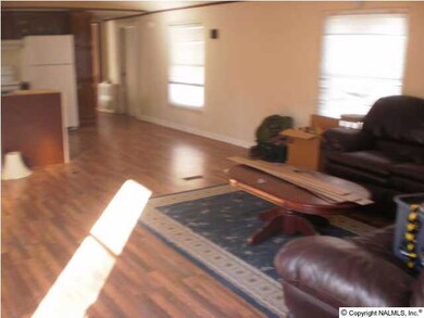 Homeowner began a remodel with very nice laminate wood flooring...just waiting for the finishing touches!