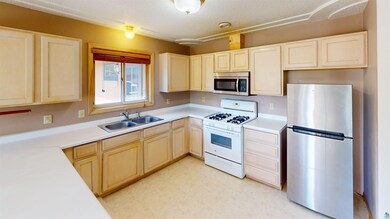 Kitchen featuring appliances with stainless steel 