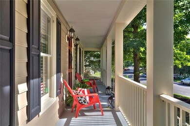 Relax on the cool porch overlooking the quiet street.