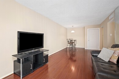 beautifully maintained unit, wood flooring in the
