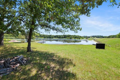 Shaded view of pond and dock