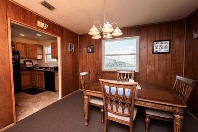 Dining room off of kitchen.