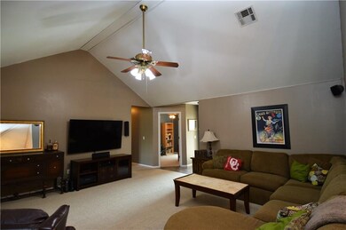 Large living area with vaulted ceilings