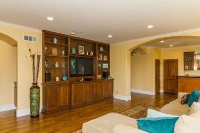 Another view of the living room and the bar area