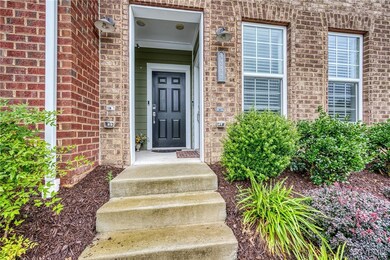 Entrance to property with brick siding