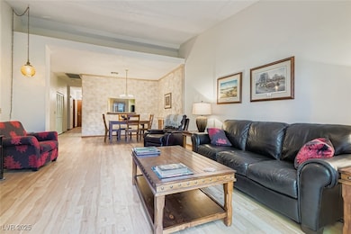Living area with light wood-type flooring