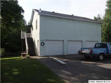 3 car garage, plus a 2 bedroom , living room, kitchen, laundry room, and bath above garage