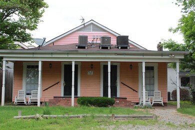 Back Porch with entry to 2 efficiency apts