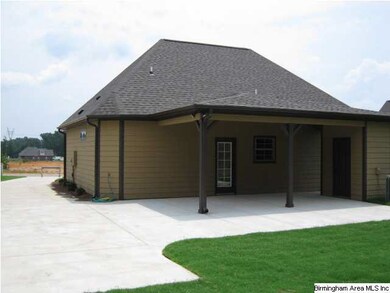 BIG BACKYARD WITH CAR PORT & EXTRA CONCRETE PARKIN