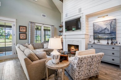 Comfortable family/living room is the perfect place to gather around and settle in.