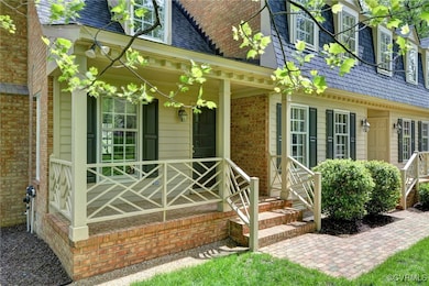 Entrance to property with roof with shingles, mans