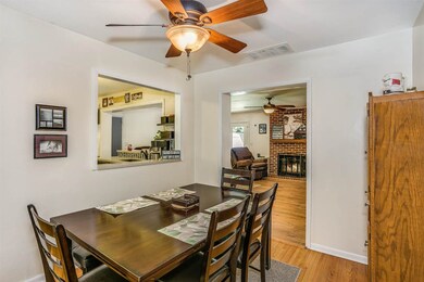 has pass-through into the kitchen and double open 