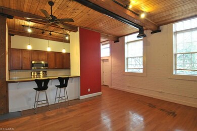 View of open kitchen/living room layout.