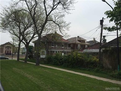 Exterior Front Side facing Public Green Space