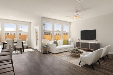 Living room with wood finished floors, visible ve