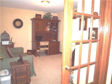 Studio/Study/Office. Library with french doors for