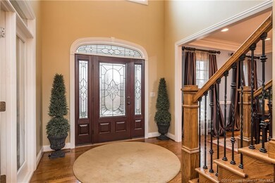 This two story hardwood entry will welcome all of 