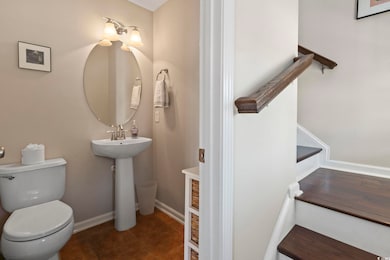 Bathroom with tile patterned flooring and toilet