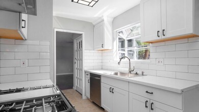 Updated kitchen with stainless steel appliances, n