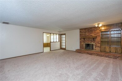 Large Living with new carpet and paint!