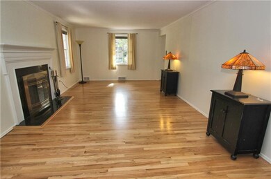4 windows surround the living room space.