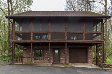 Side view of home. Lower level entrance into gamer