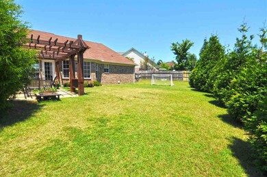The large backyard offers plenty of room for the w