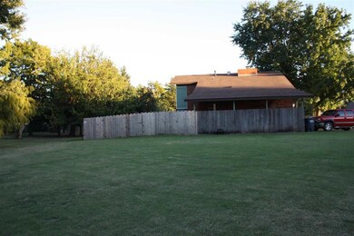 Only a portion of the yard is fenced. There is muc