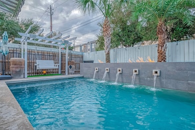 Situated on a corner lot in the heart of Houston H