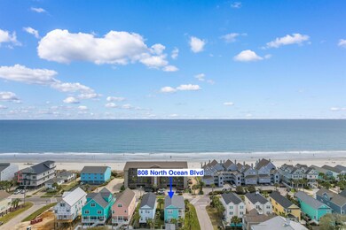 Birds eye view of property featuring an oceanview,