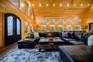 Living room with french doors, dark hardwood / woo