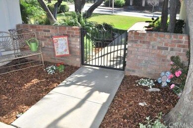 Gated front courtyard.