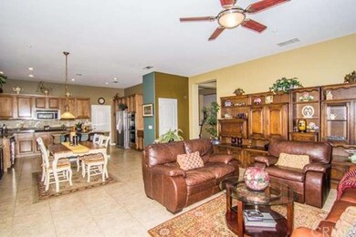 Family room opens to the kitchen and breakfast are