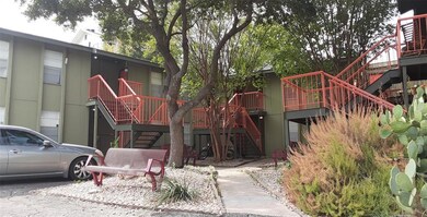 View of property with stairway