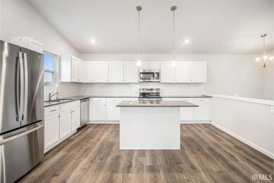 The kitchen includes Quartz counters with subway t