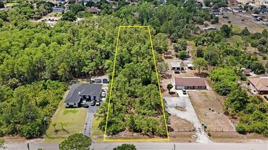 Aerial perspective of suburban area with property 