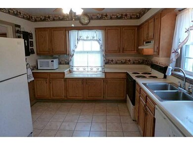 Kitchen. Oak kitchen with neutral counter tops and