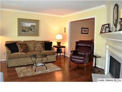 Beautiful living room is oversized and features cr