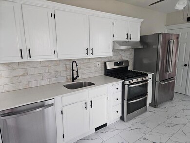 Quartz countertops and stainless steel appliances
