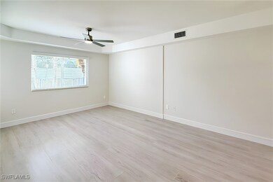 Unfurnished room featuring light wood-style floors and baseboards