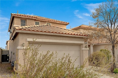 Mediterranean / spanish home with stucco siding, a
