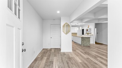 Unfurnished living room with light wood-type floor