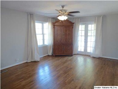 SPACIOUS LIVING ROOM WITH BEAUTIFUL HARDWOOD FLOOR