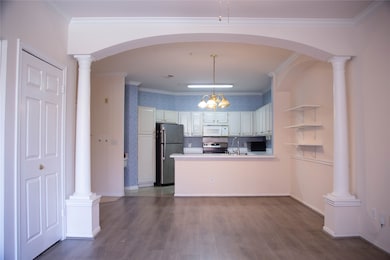 This photo showcases a bright, open-concept kitche