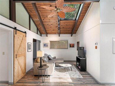 Living Room, High Ceilings and Skylights