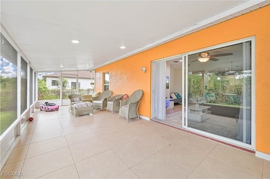 Sunroom / solarium featuring an outdoor living space