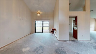 FORMAL LIVING ROOM AND ENTRANCE TO KITCHEN FROM EN